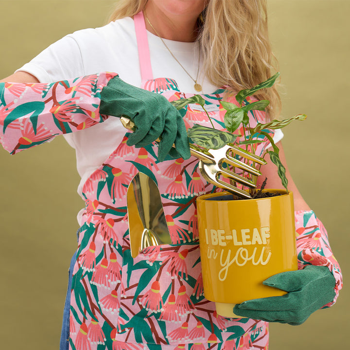 annabel trends blossom branches linen long sleeve garden gloves and apron, gold garden toolsand i be-leaf in you ceramic pot plant