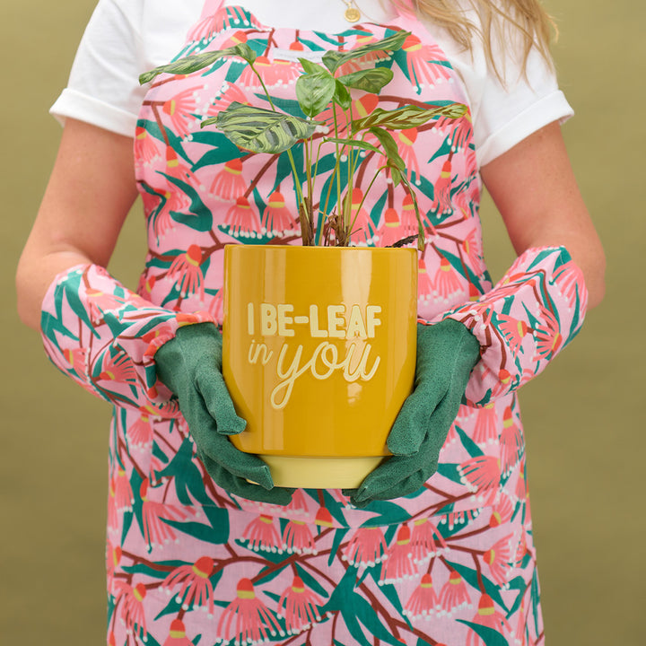 annabel trends blossom branches linen long sleeve garden gloves and apron, gold garden toolsand i be-leaf in you ceramic pot plant