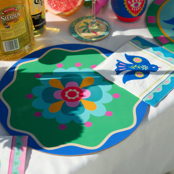 Annabel Trends fiesta table setting with placemats, coasters, paper napkins