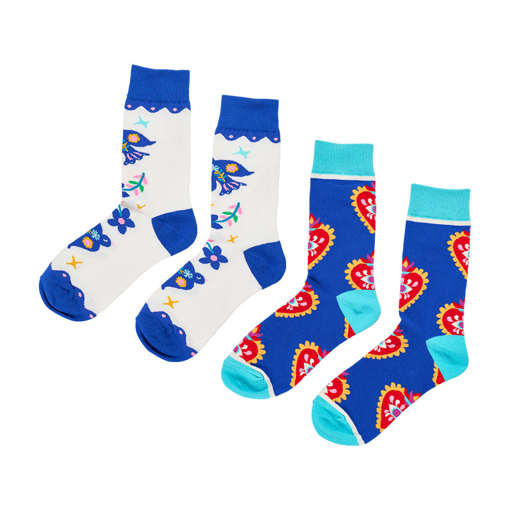 Two pairs of colorful socks with floral and abstract designs on a white background