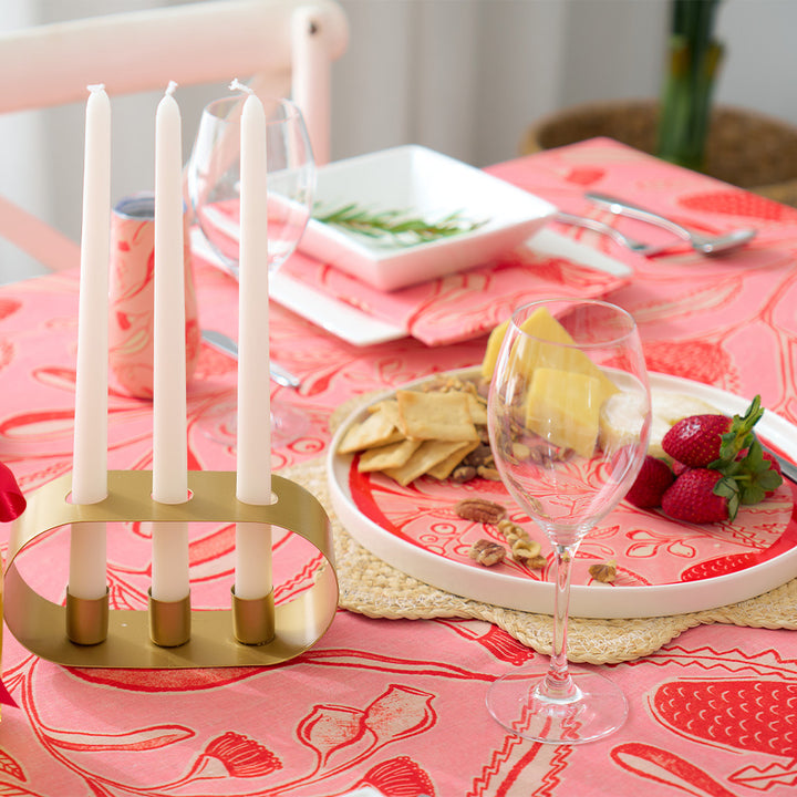 Annabel Trends Trailing Natives Linen Tablecloth, napkins, serving plate and gold candle holder