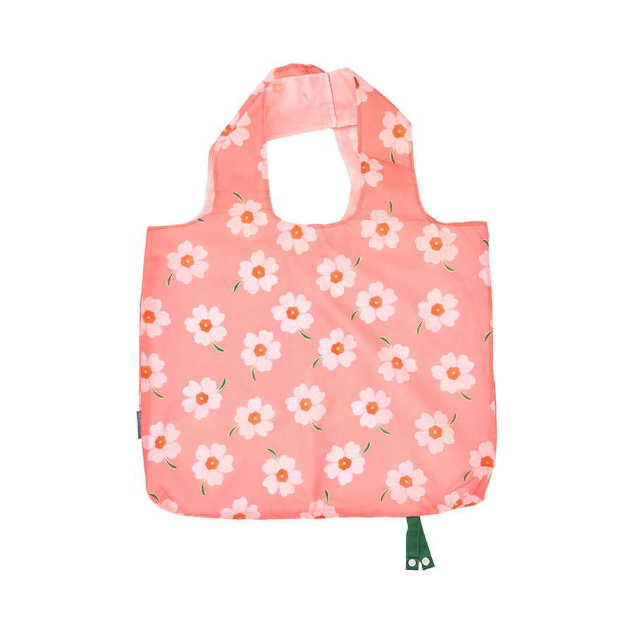 Floral-patterned pink reusable bag on a white background