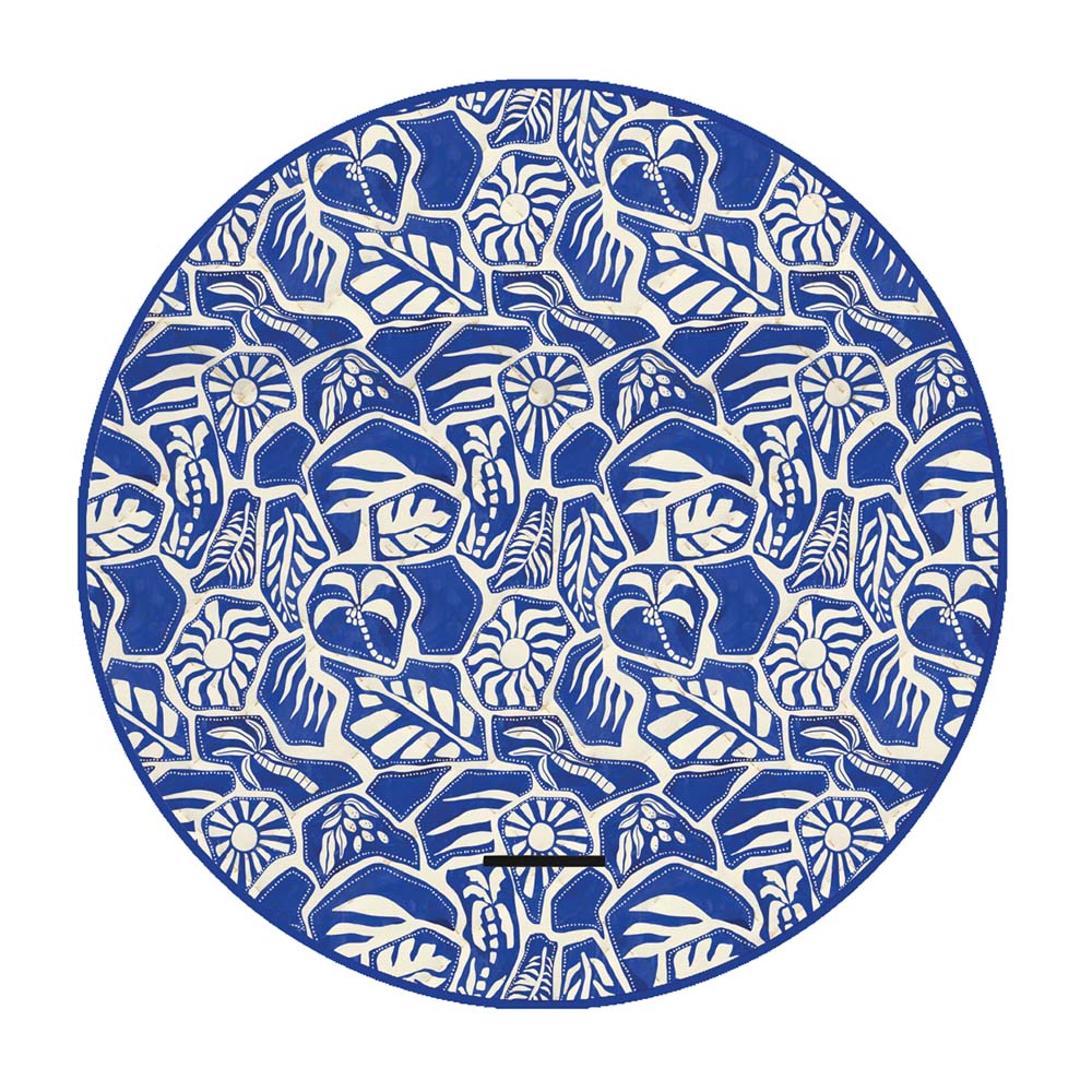 Circular blue and white patterned picnic rug on a white background