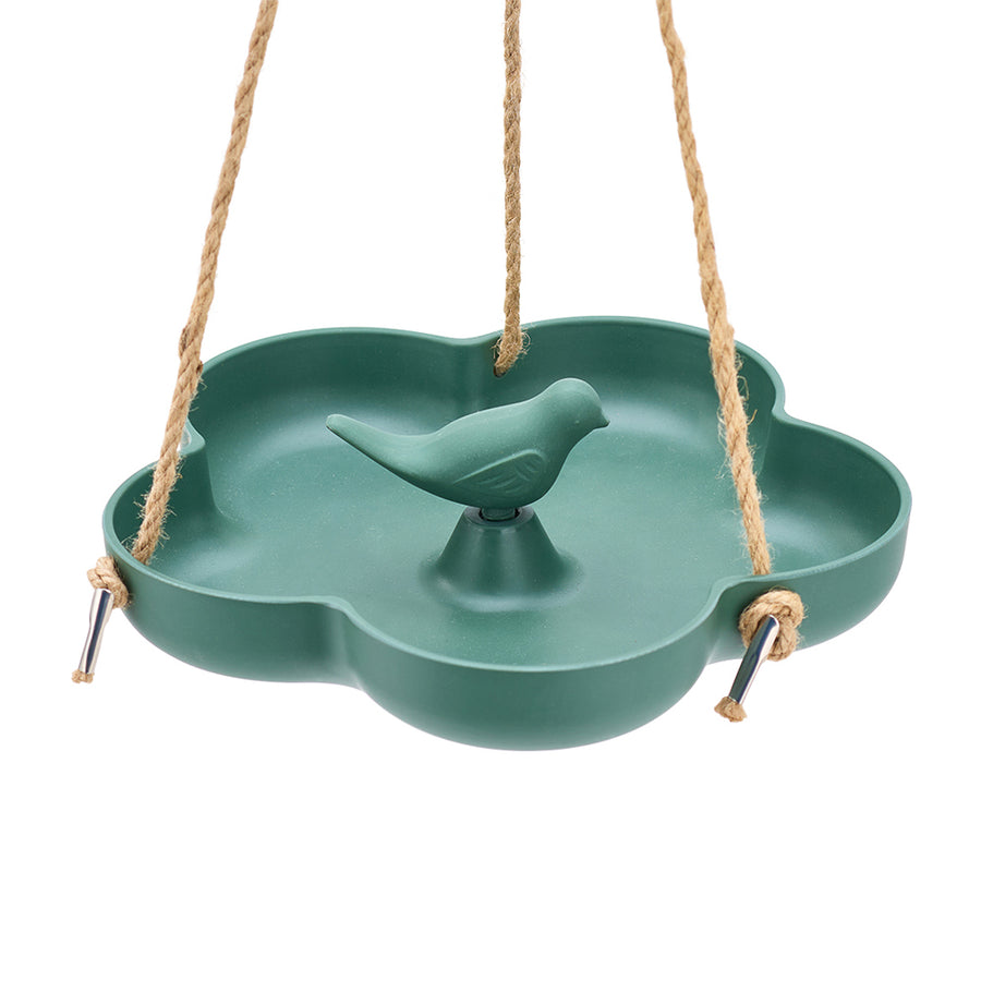 Green bird-shaped bird feeder with a bird figure on a white background