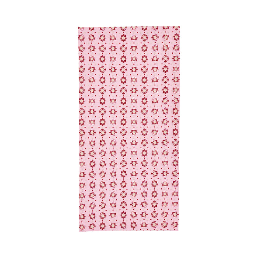 Pink happywrap with a red floral pattern on a white background