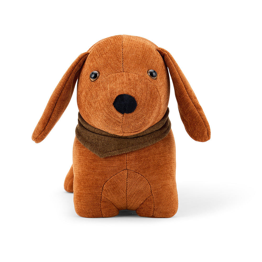 Brown stuffed dog doorstop with a scarf on a white background