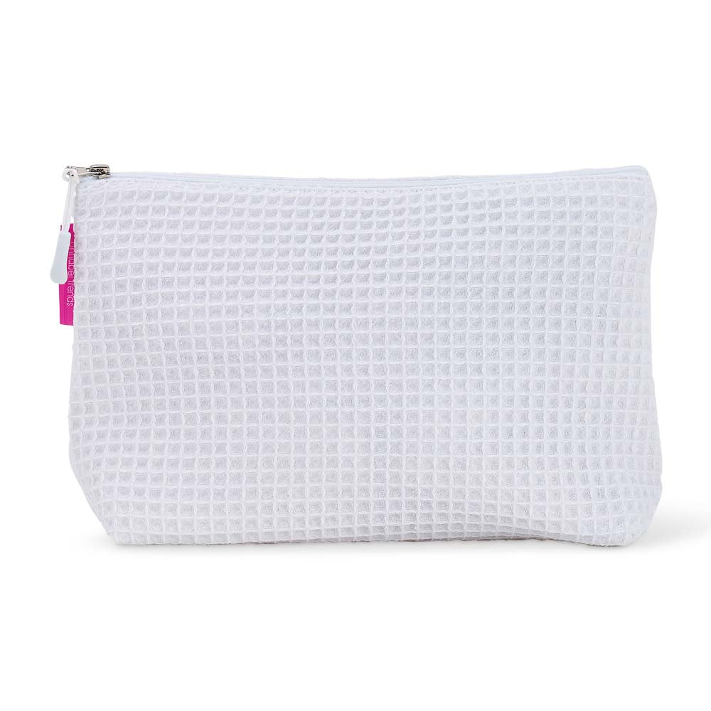 White waffle-textured cosmetic bag with a white zipper on a white background