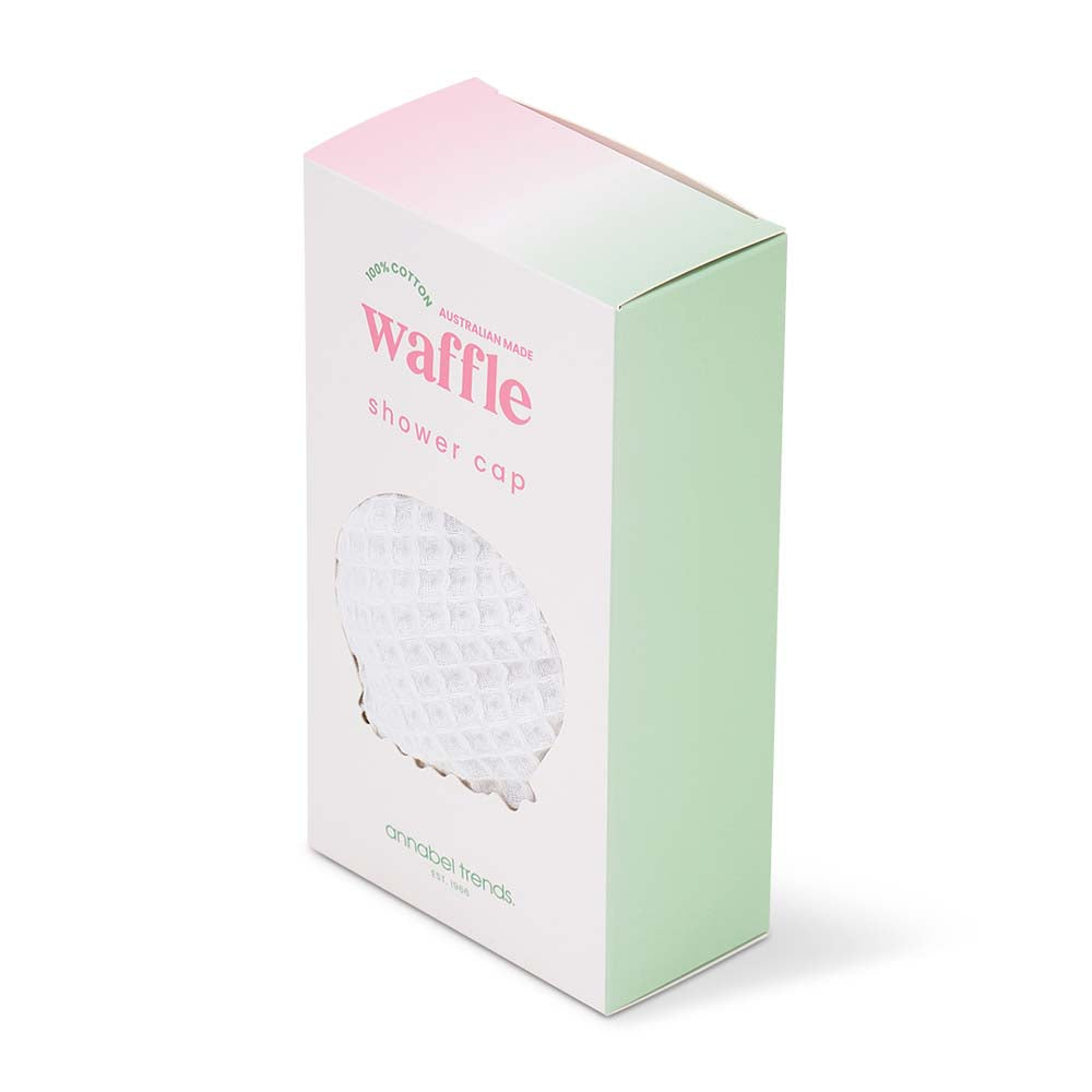 Box of a waffle shower cap with a gradient design on a white background