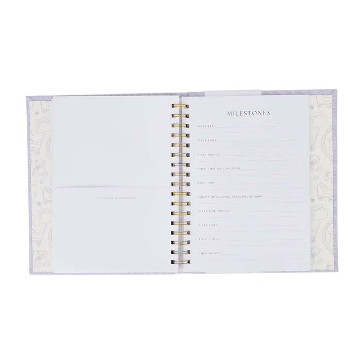 Open planner with 'Milestones' section on a white background