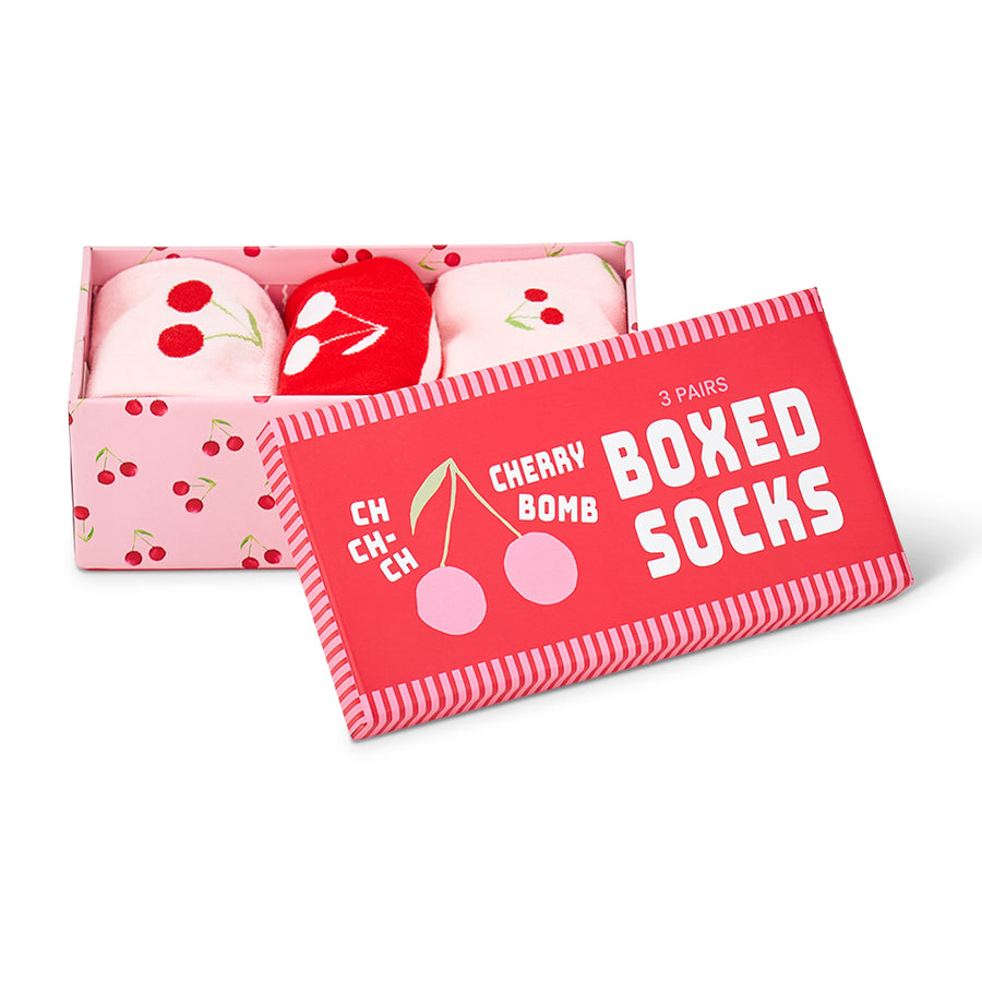 Boxed set of cherry-themed socks with a red label on a white background