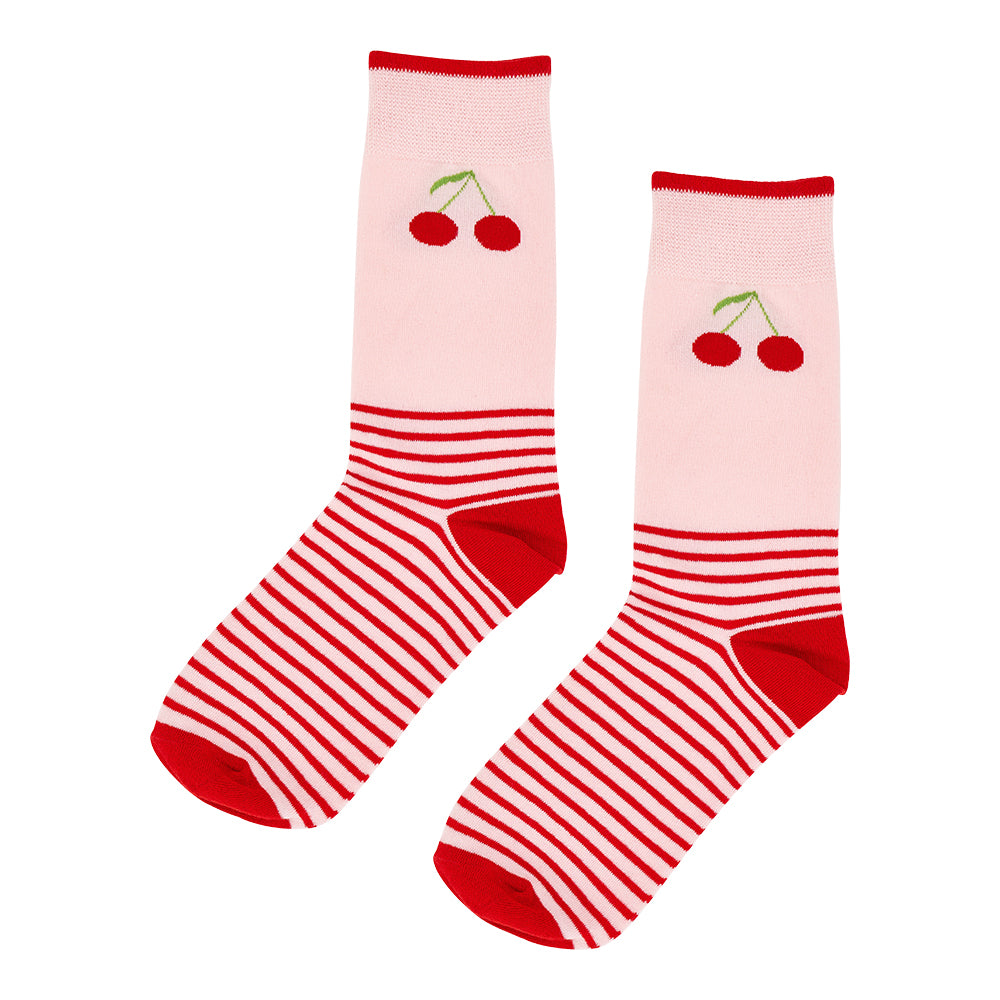 Pair of socks with red and white striped pattern and cherry design on a light pink background