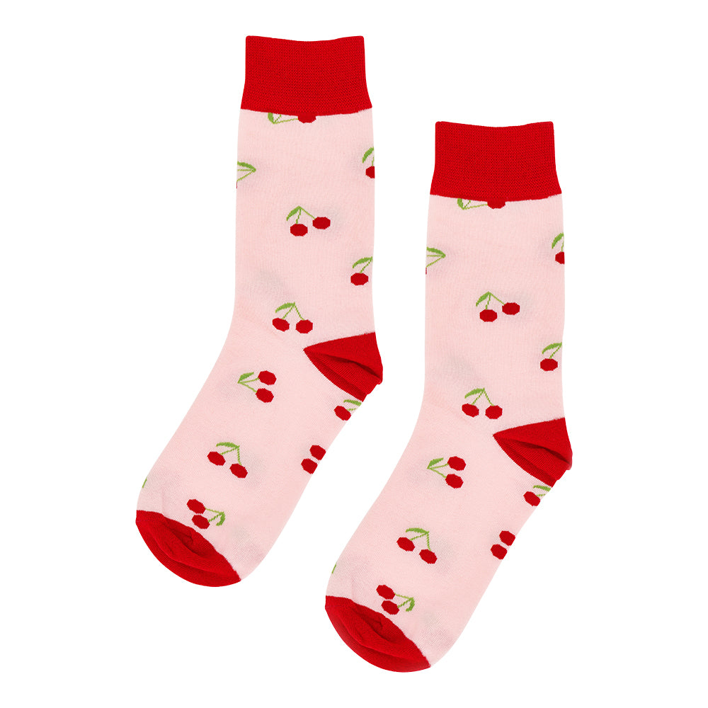 Pink socks with red cherries and cuffs on a white background