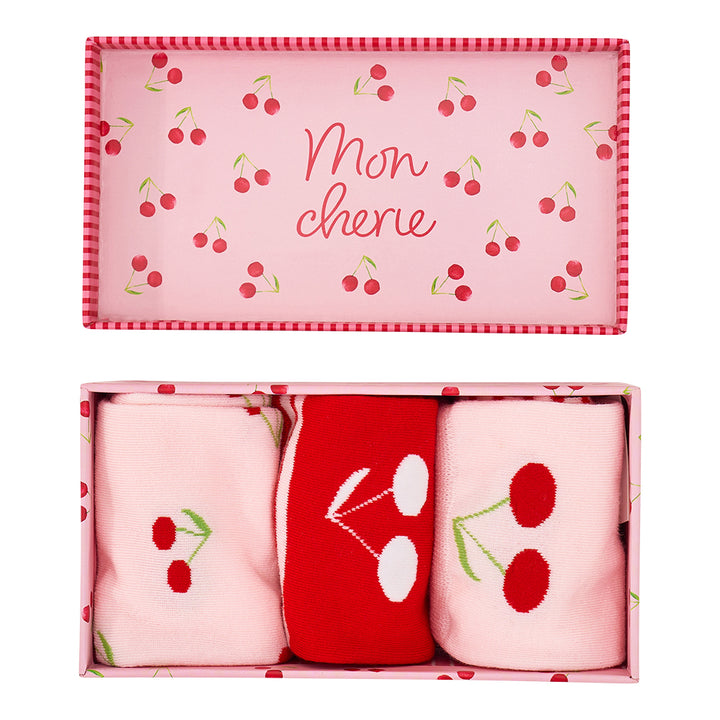 Set of Cherry bomb socks with cherry design in a box labeled 'Mon cherei' on a pink background.