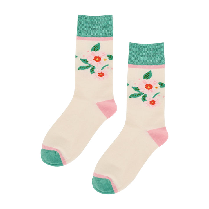 Pair of socks with floral design on a white background