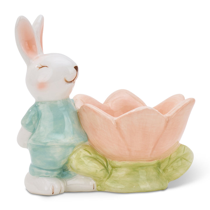 Ceramic bunny egg cup with a pink flower on a white background