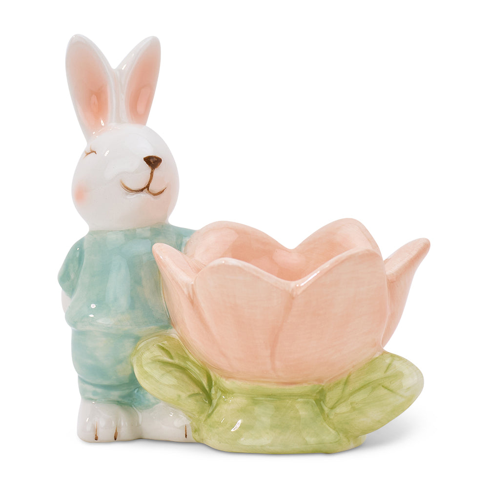 Ceramic rabbit egg cup with a pink flower on a white background