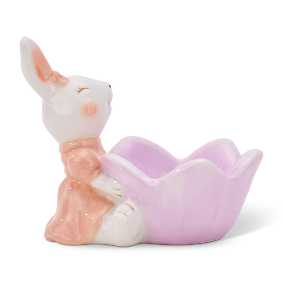 Ceramic bunny egg cup with a pink flower on a white background