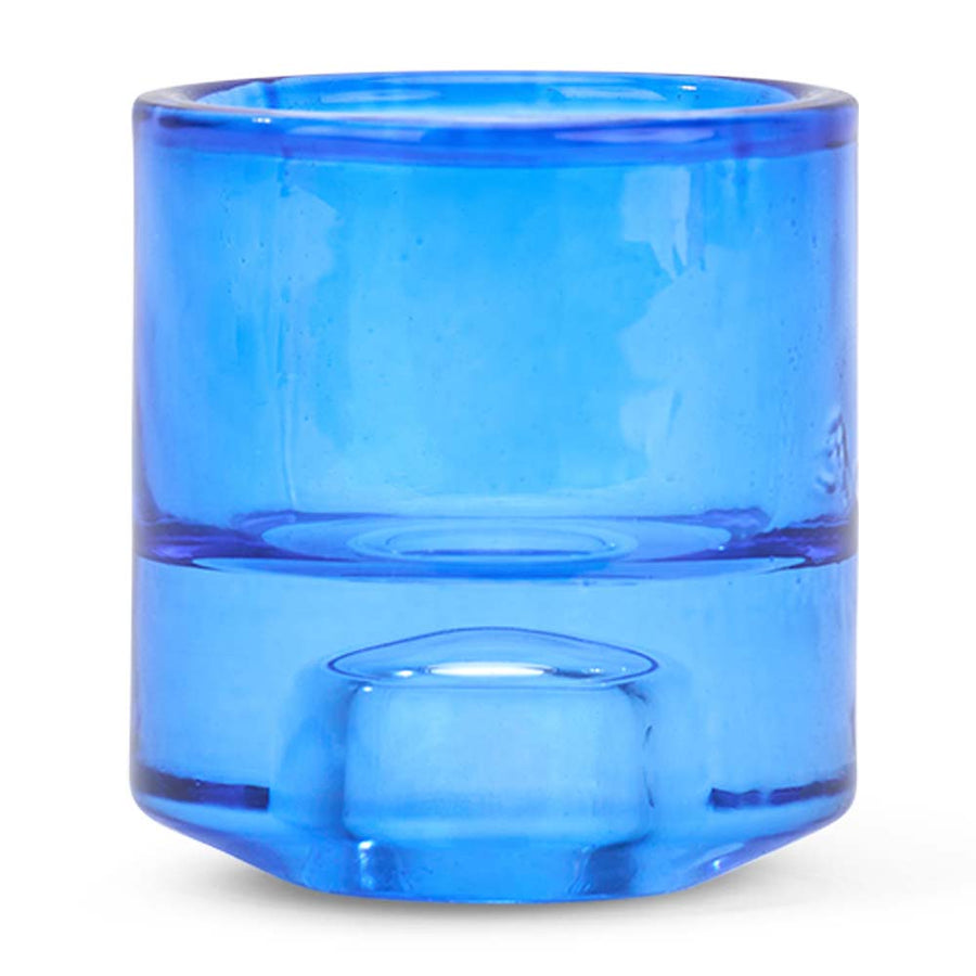Blue glass candle holder on a white background