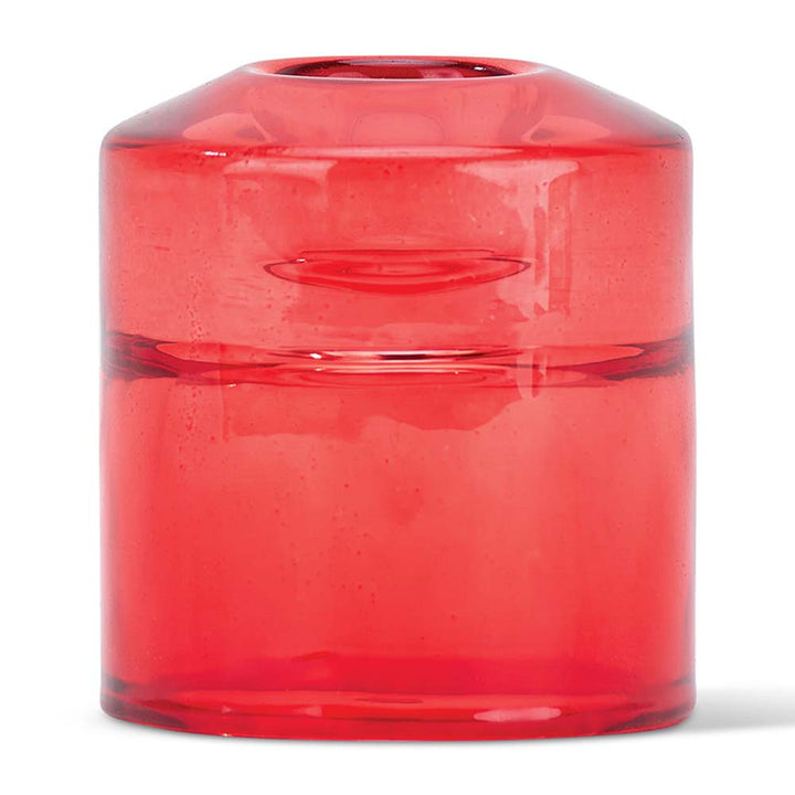 Red glass candle holder on a white background