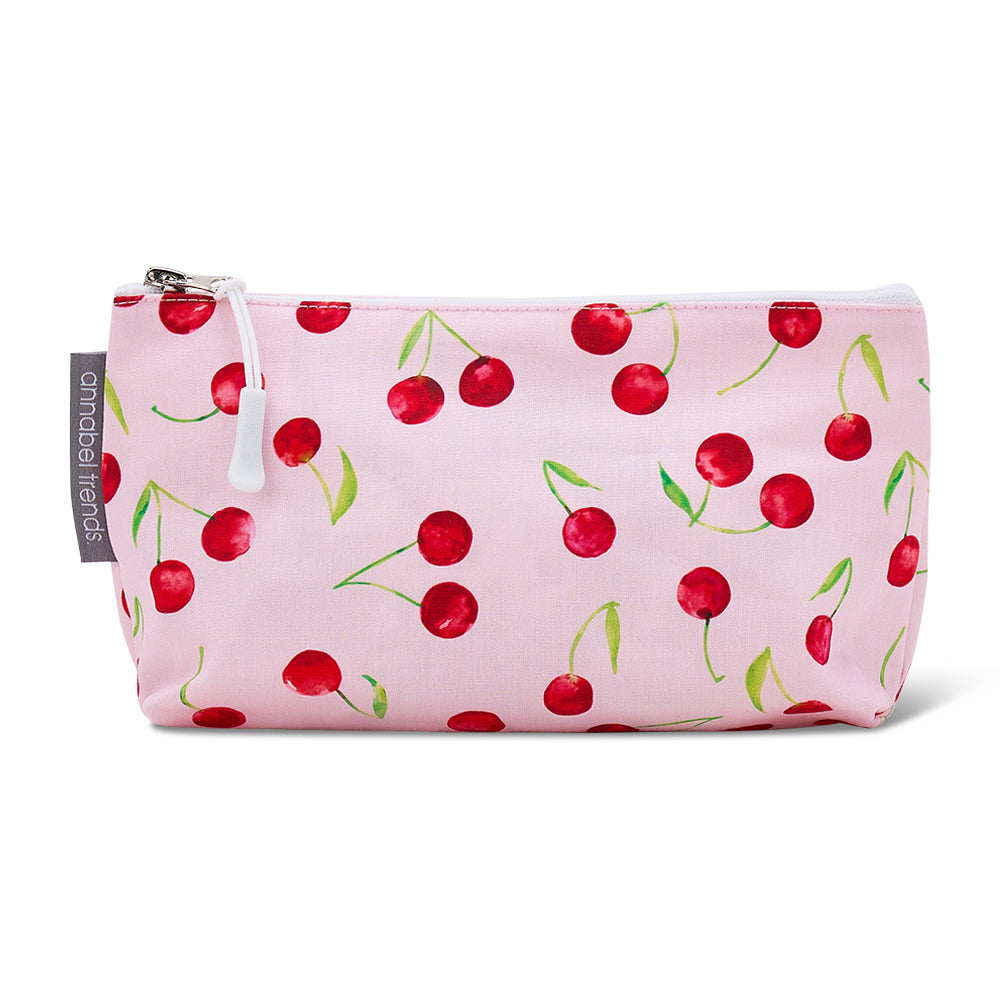 Pink cotton cosmetic bag with cherry pattern on a white background