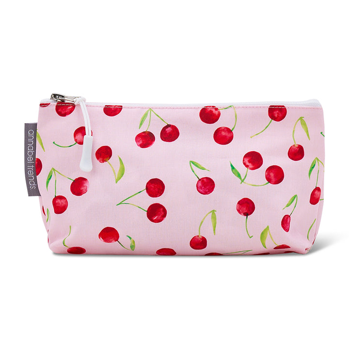Pink cotton cosmetic bag with cherry pattern on a white background
