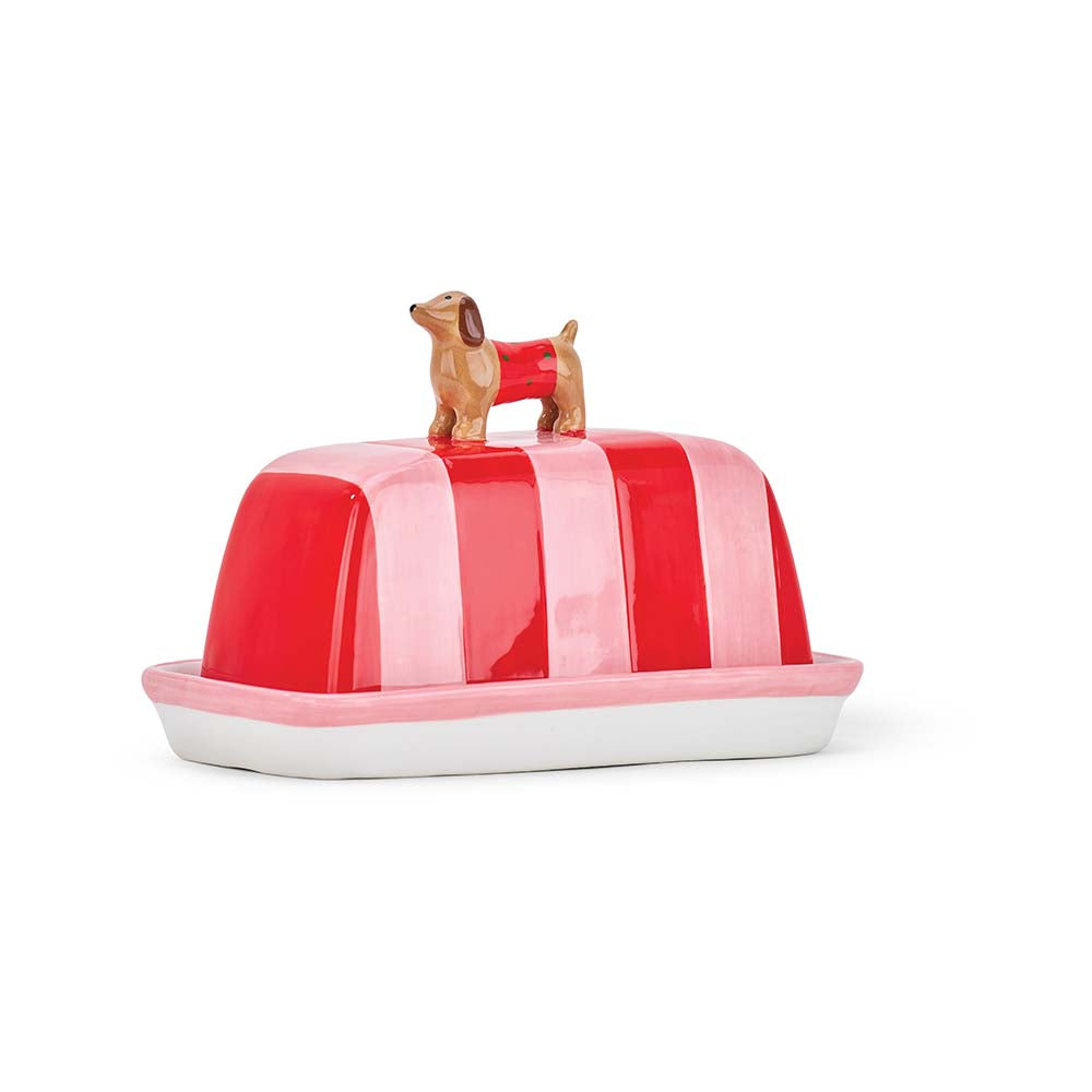 Butter dish with red and white striped lid featuring a dog design on a white background