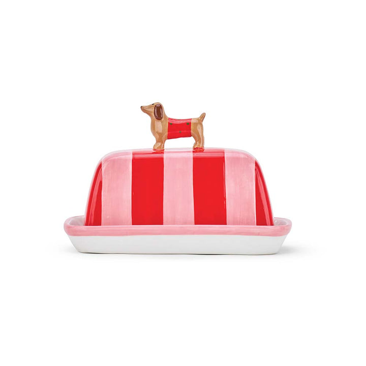 Butter dish with red and white striped lid featuring a dog design on a white background