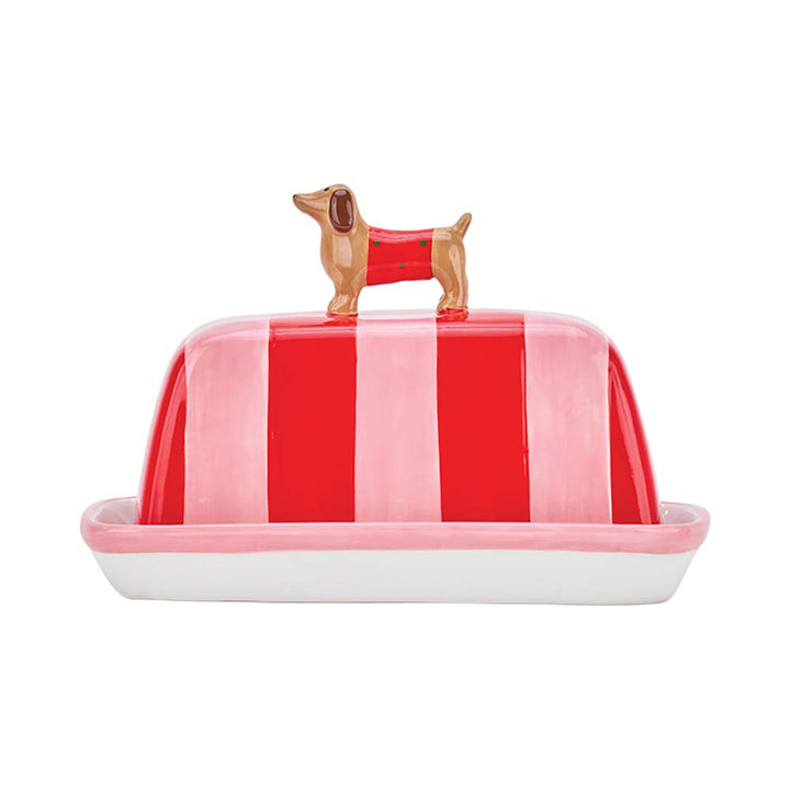 Butter dish with red and white striped lid featuring a dog design on a white background