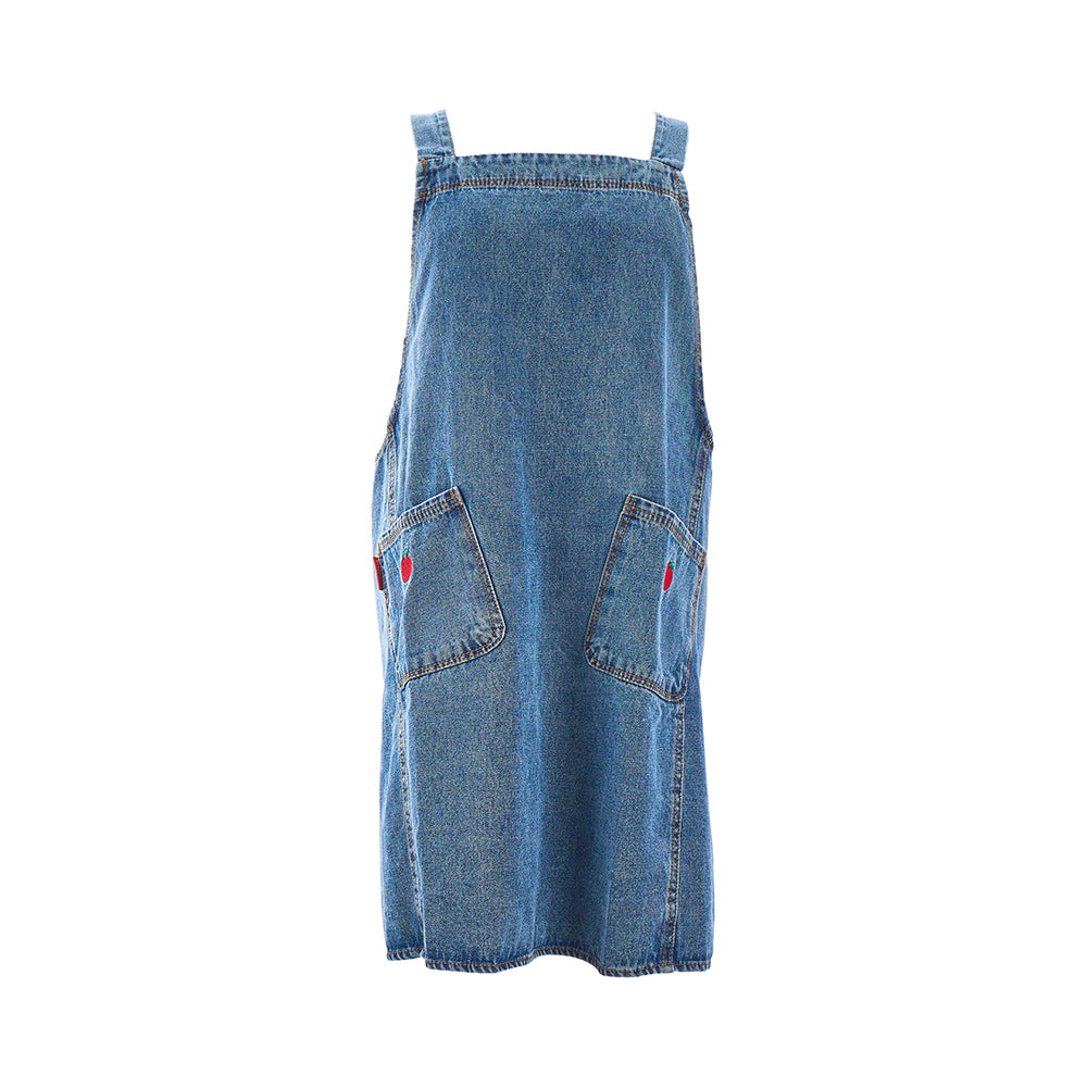 Blue denim apron with cross over straps on a white background