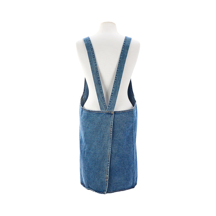 Blue denim apron on a mannequin against a white background