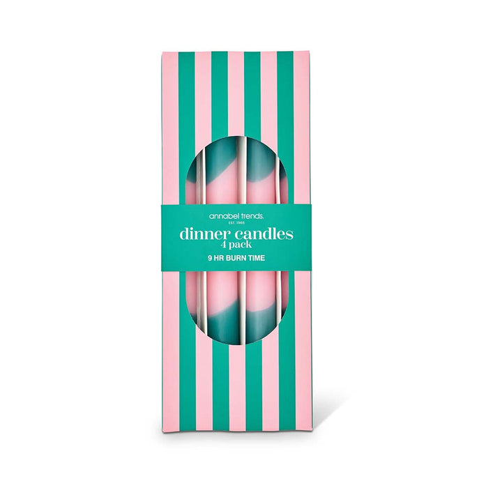 Pack of dinner candles with striped packaging on a white background