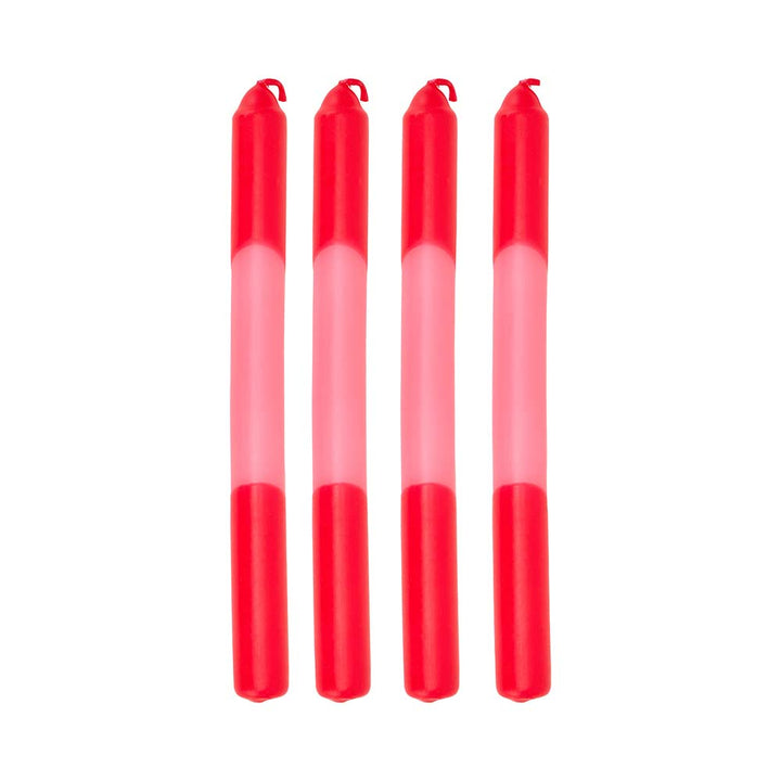 Four red and pink gradient candles on a white background