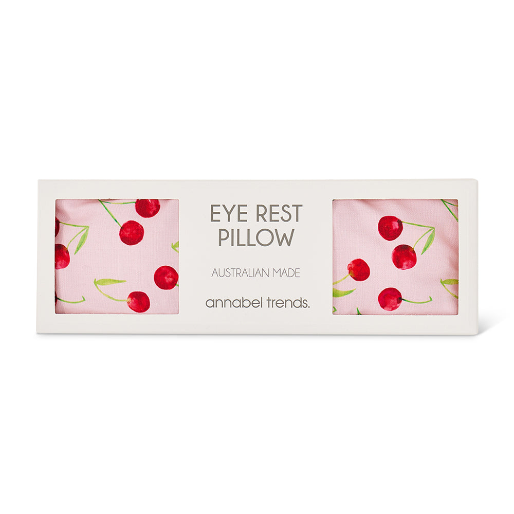 Eye rest pillow packaging with cherry design on a white background