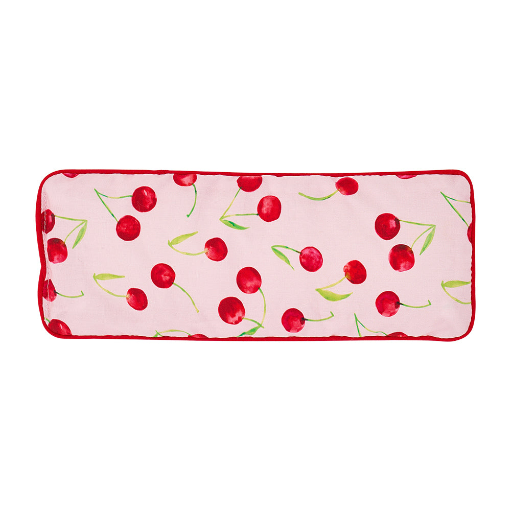 Rectangular pink eye rest pillow with cherry pattern on a white background