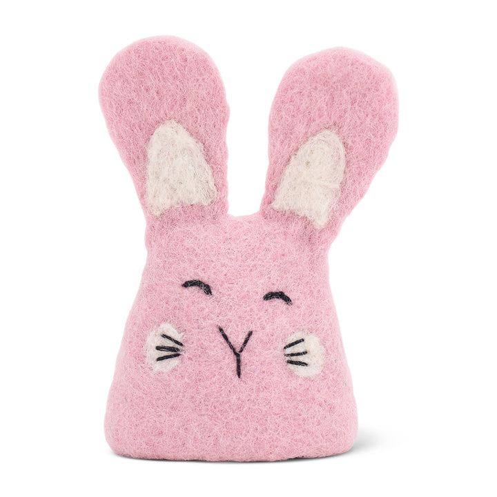 pink felt egg warmer with pink ears and cheeks on a white background