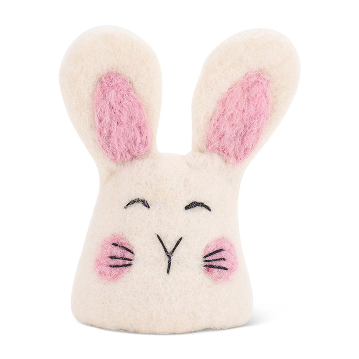 white felt egg warmer with pink ears and cheeks on a white background
