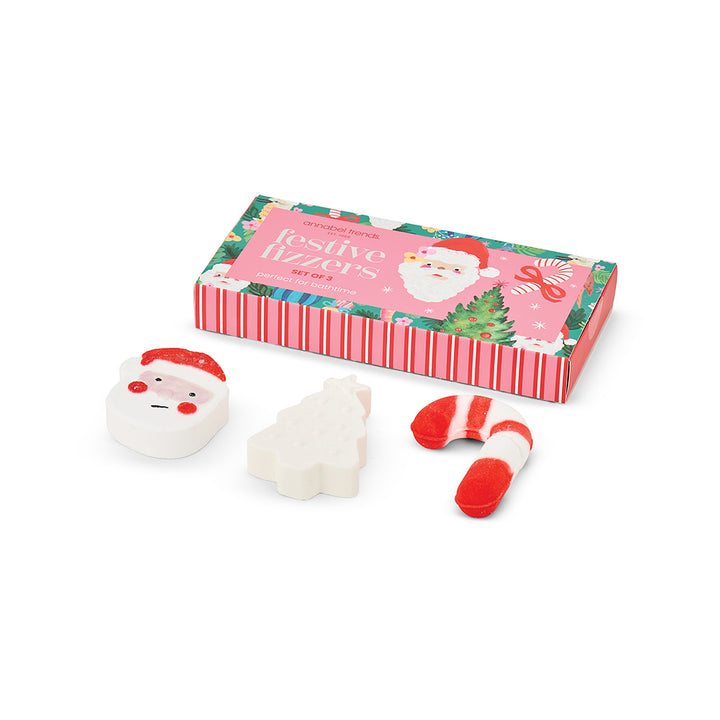 Christmas-themed bath fizzers with Santa Claus design on a white background