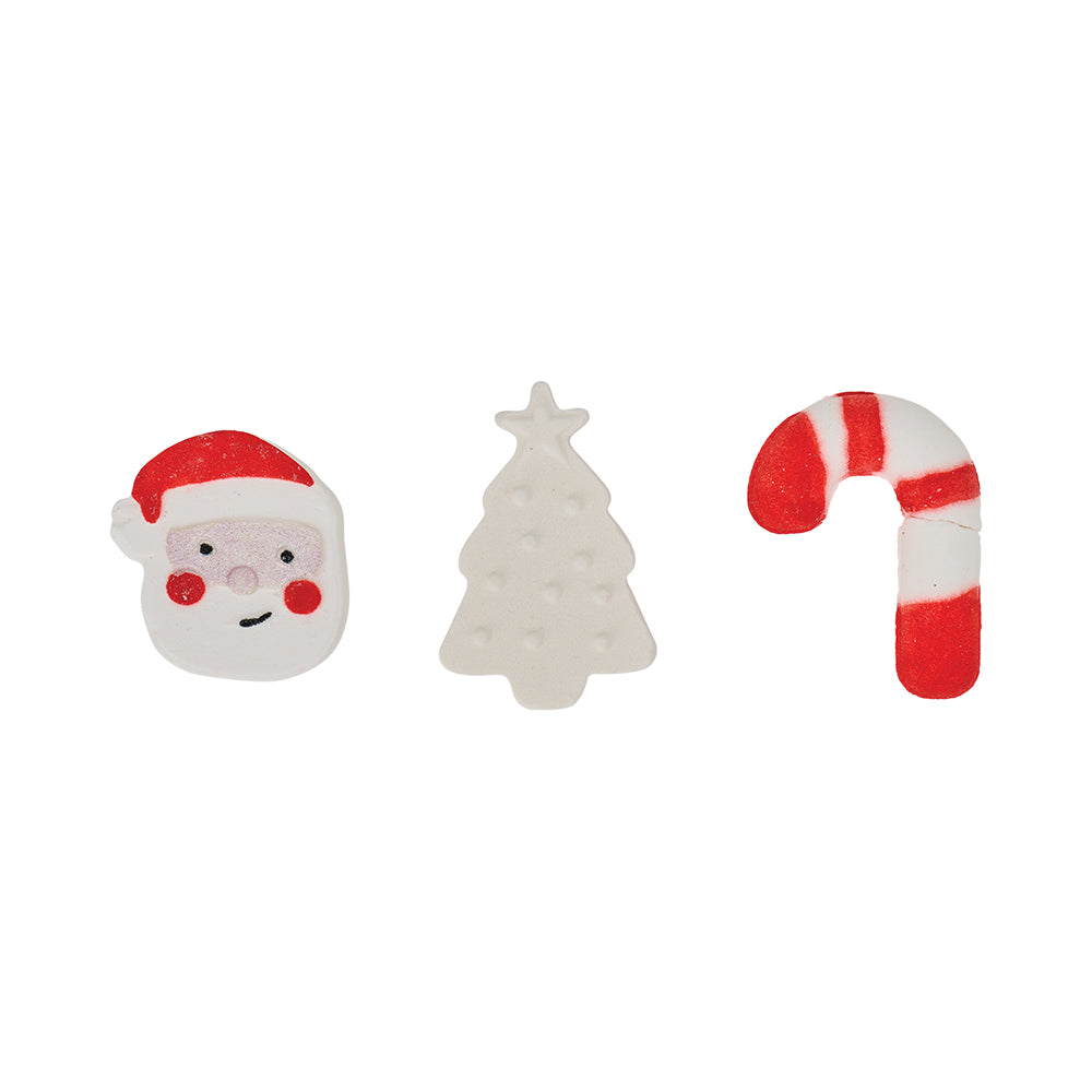Three Christmas-themed bath fizzers shaped santa face, tree, and candy cane on a white background.