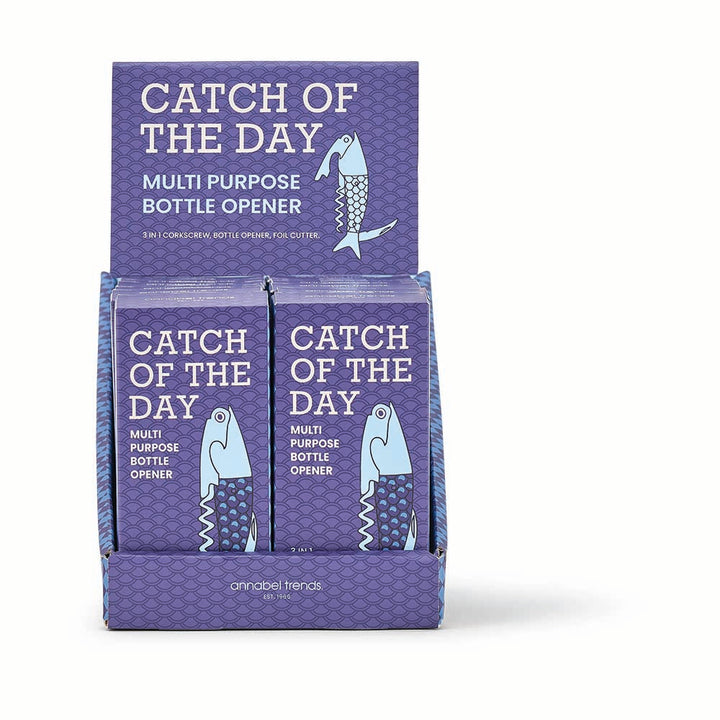 Display CDU of 'Catch of the Day' multi-purpose bottle openers with blue packaging.
