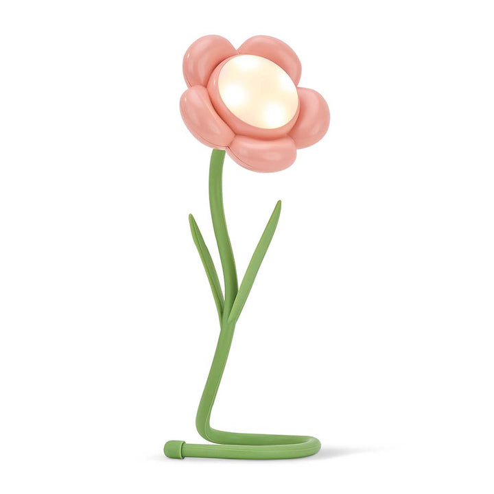 Flower-shaped lamp with a pink flower and green stem on a white background