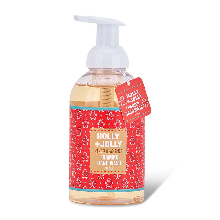 Bottle of Holly Jolly foaming hand wash with a red label on a white background