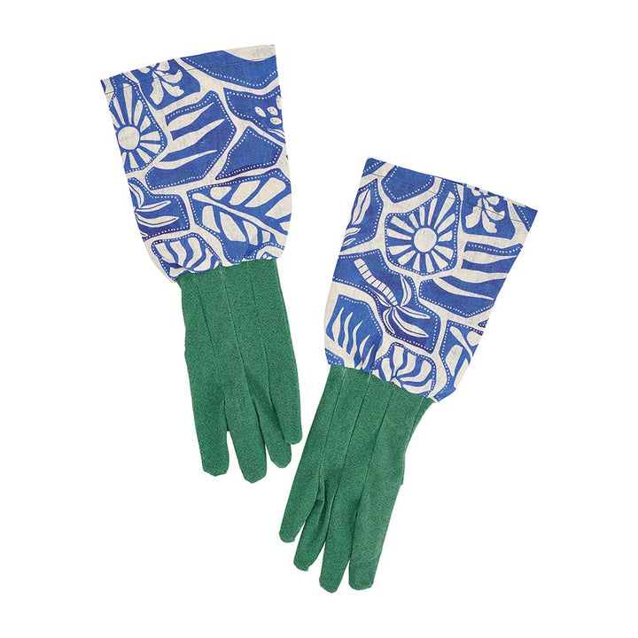 Green gloves with blue and white patterned cuffs on a white background