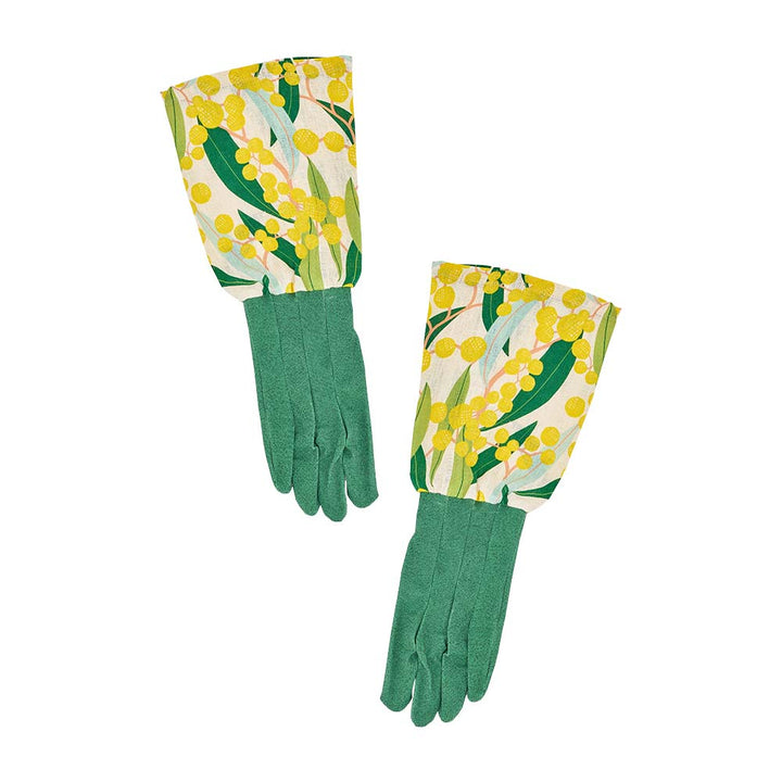 Pair of green gardening gloves with floral pattern on a white background
