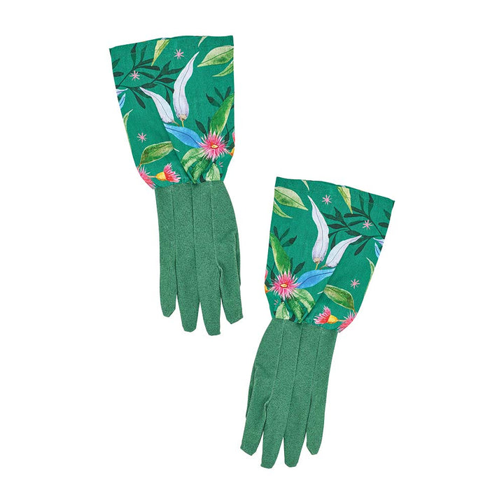 Green gloves with tropical leaf pattern on a white background