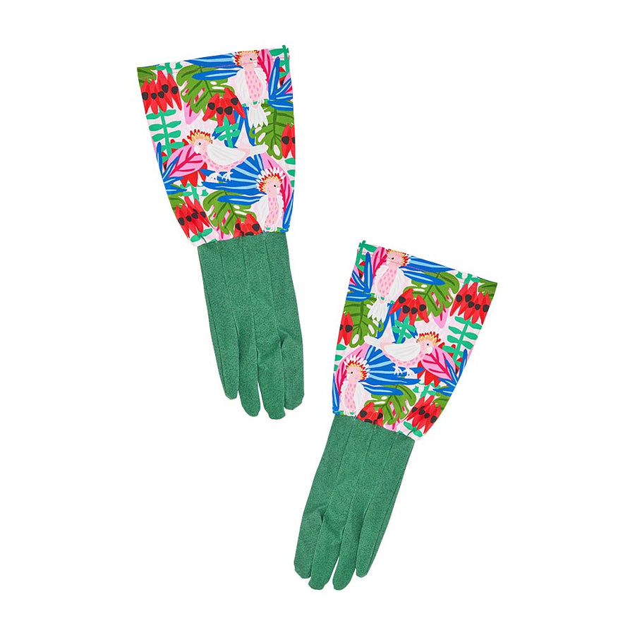 Pair of green gardening gloves with colorful floral pattern on a white background