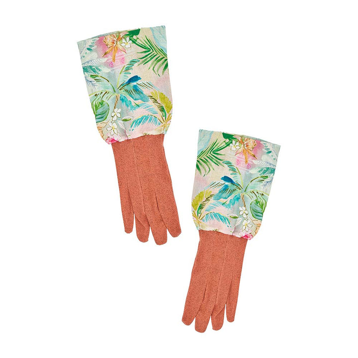 Pair of gardening gloves with floral cuffs on a white background