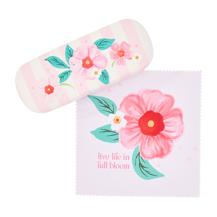 Floral-themed eyeglass case and cleaning cloth on a white background