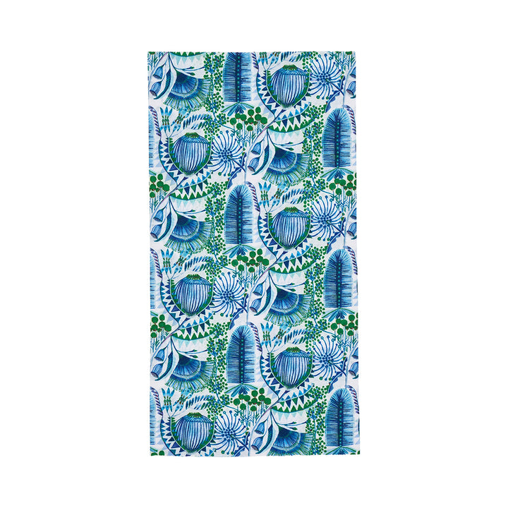 Towel with blue and green floral pattern on a white background