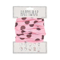Pink headband with brown polka dots on a white background