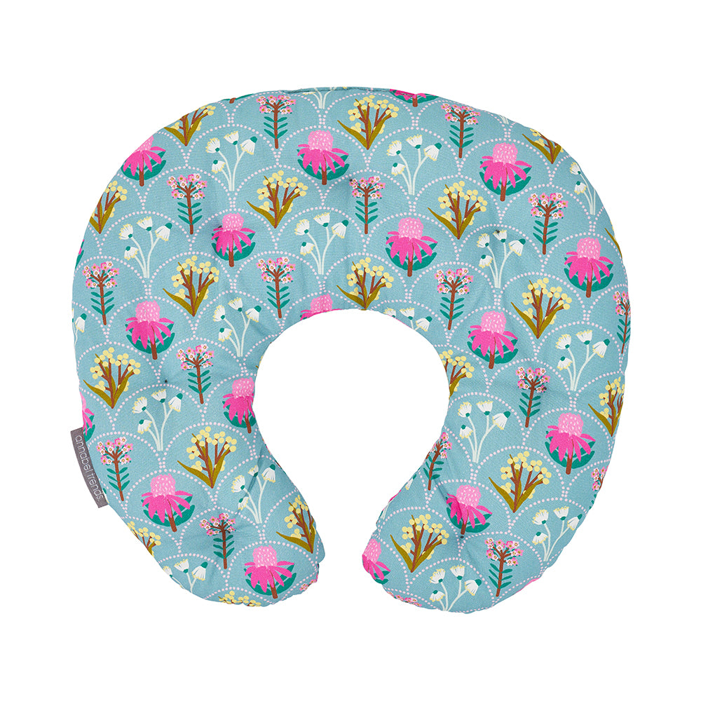 Floral patterned neck pillow on a white background